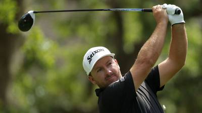 DeChambeau surges to halfway lead as McDowell makes cut