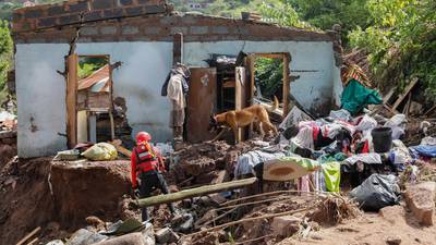 South Africans search for survivors in ruins of floods