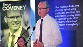 Coveney vows to stay in leadership race at Cork rally