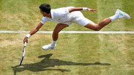 Djokovic nonplussed by McEnroe’s Woods comparison