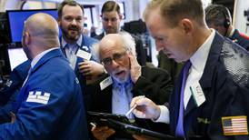 European shares inch lower on day of corporate news