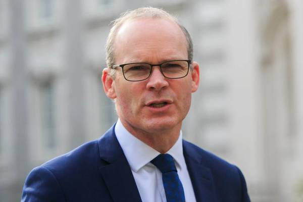 Temporary means temporary, Coveney assures UK on backstop