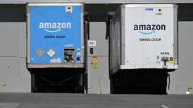 Amazon’s online sales lift earnings and send shares higher