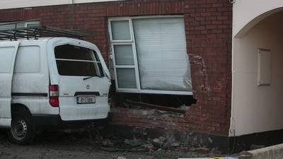 Man in serious condition after driving van into house