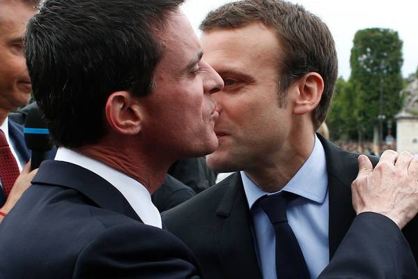 French Socialists angered as former PM Valls defects to Macron