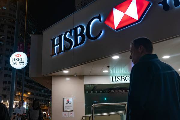 HSBC to overhaul business model as profit tumbles 35%
