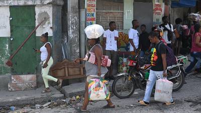 Haiti aid groups halt operations as thousands flee gang warfare