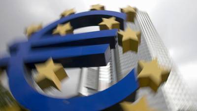 Euro sinks to nine-year low against dollar