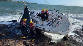 Ten sailors escape injury after yacht blown on to rocks