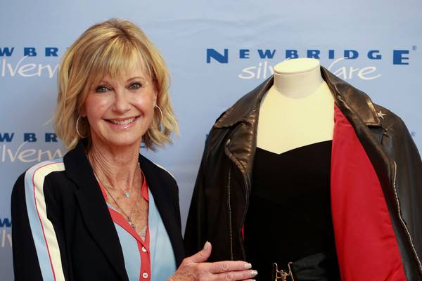 ‘I had to be stitched in’: Olivia Newton-John to sell her skin-tight Grease outfit