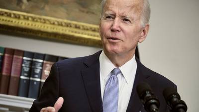Joe Biden takes a swipe at Supreme Court as he signs bipartisan gun safety bill into law