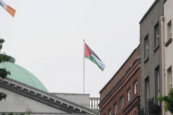 Flying the Palestinian flag
