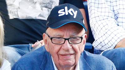 Murdoch admits  topless pin-ups are ‘old fashioned’