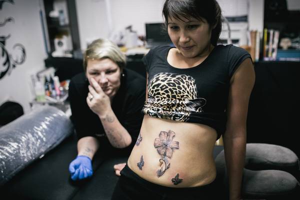 Tattooing over the scars of domestic violence