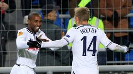 Defoe closes on record mark as Spurs coast home in Moscow