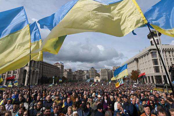 Ukrainians march against president’s peace plan with Russia