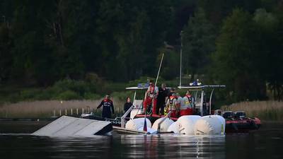 Why were Italian and Israeli secret service agents on a boat in northern Italy when they died in capsize?