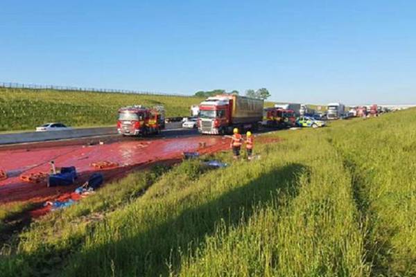 ‘Like a horror film’: Tomato puree spillage leaves road looking like disaster zone