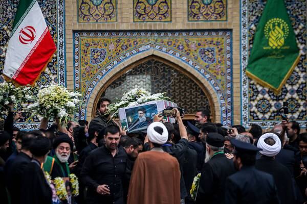 Mourners gather in muted memorial for Iran’s president Ebrahim Raisi