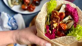 Halloumi and beet hummus wrap with grilled vegetables