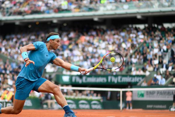 Rafael Nadal gets off to a delayed winning start at French Open