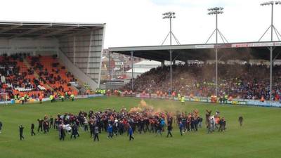 Blackpool game abandoned after fans protest on pitch