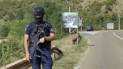 Police in Kosovo surround 30 gunmen in monastery after officer killed