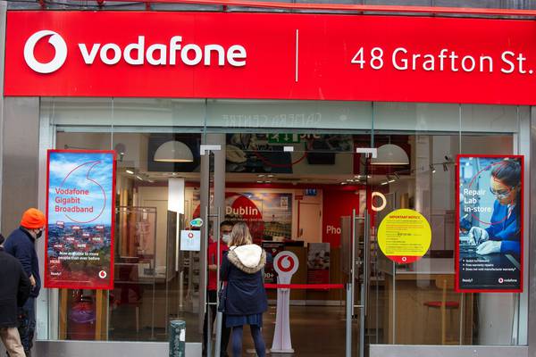 Vodafone reports rise in earnings and return to profit