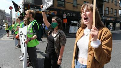 Environmental activists stop the traffic in Dublin