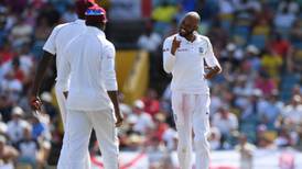 England thrashed as part-time spinner Chase takes eight wickets