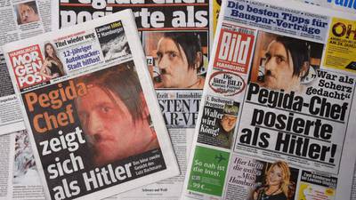 German Pegida chief resigns as Hitler pose prompts inquiry