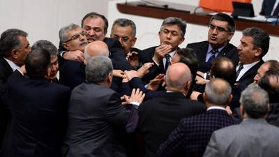 Turkish PM tightens grip on judiciary in parliament vote