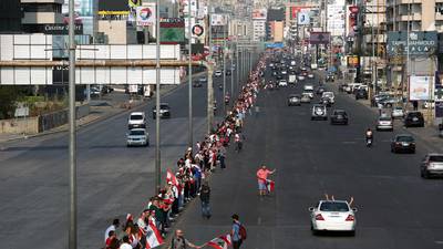 Protesters form human chain across Lebanon as unrest continues