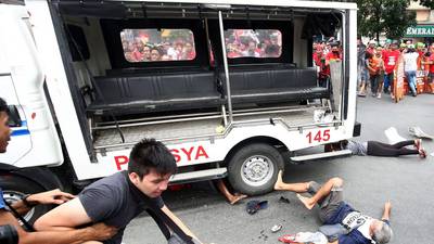 Manila police van rams into protesters at anti-US rally