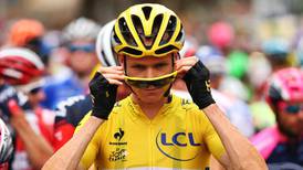 Tour leader Chris Froome claims he had urine thrown at him