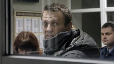 Putin critic Alexei Navalny held by police for breaking house arrest