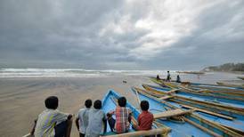 Cyclone Hudhud rips through India, while typhoon hits Japan