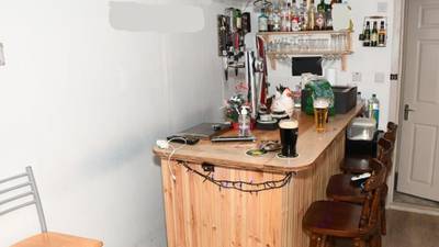 Shebeen with draught beer and stout on tap is raided by gardaí