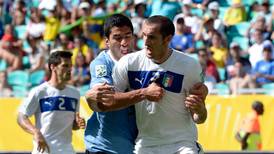 Uruguay once again rallies behind flawed native son Luis Suarez