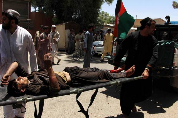 Dozens killed in Afghanistan as car bomb hits bank branch