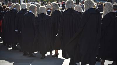 Dispute over pay disparity among barristers delays trial opening