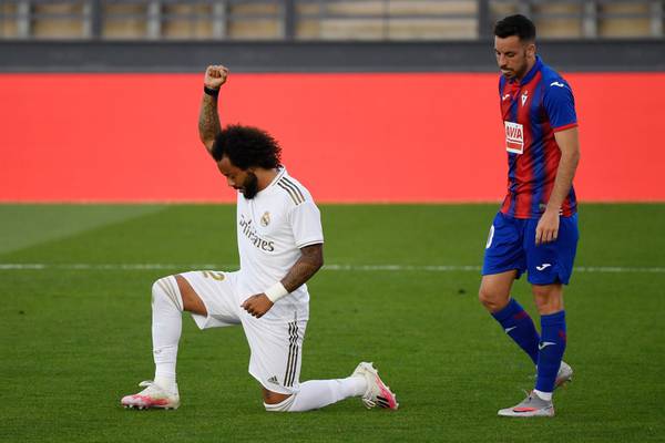 Real Madrid make winning return as Marcelo takes a knee