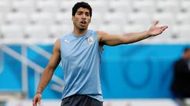 Uruguay captain Lugano angry at 'barbaric' Suarez ban
