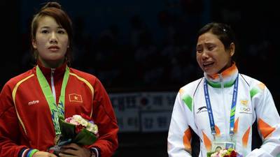 Indian boxer Sarita handed one-year ban for refusing to accept bronze medal