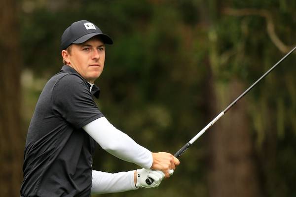 Jordan Spieth among the leaders at a soggy Pebble Beach