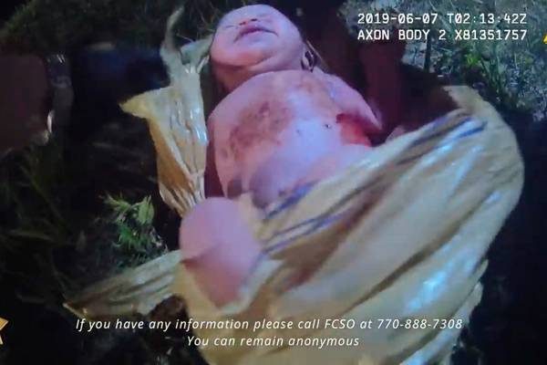 Baby found alive in plastic bag in woods in US