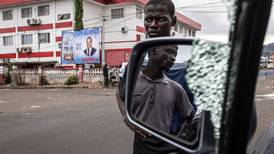 Sierra Leone’s incumbent president leads election amid tense wait for final result