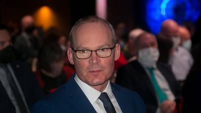 Coveney ‘didn’t take much notice’ of Covid-19 rule-breaking photo