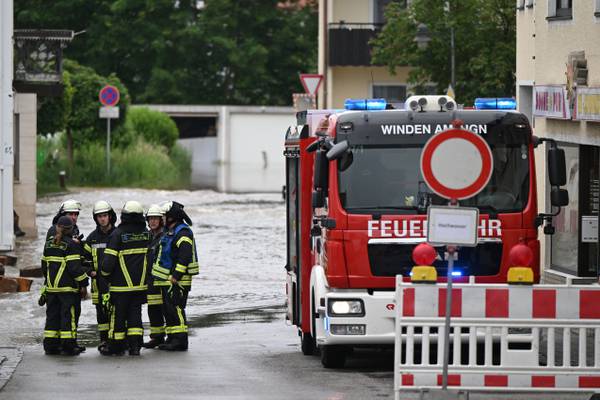 Rescue worker killed and train derailed in Bavaria flooding