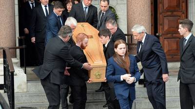Mourners bid farewell to former garda Joe Ainsworth